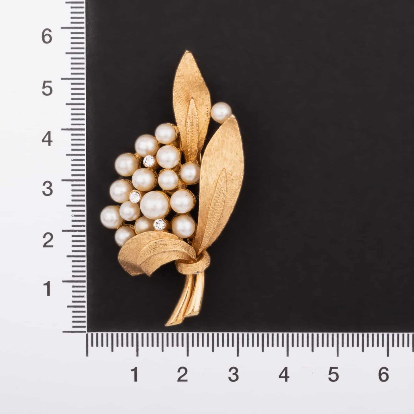 CORO gold-plated brooch with pearls and rhinestones