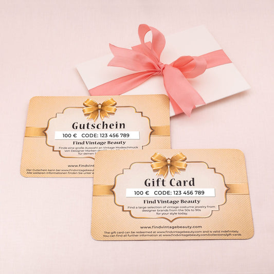 Gutschein-Gift-Card-100€-im-Umschlag-mit-rosa-Schleife