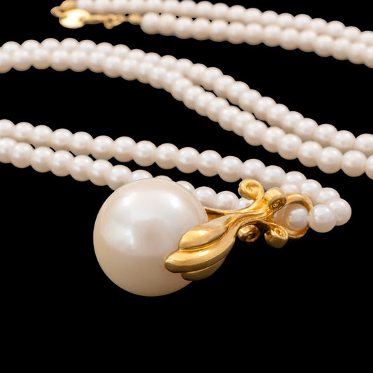 Avon-lange-Perlenkette-großer-Perlen-Anhänger-1994