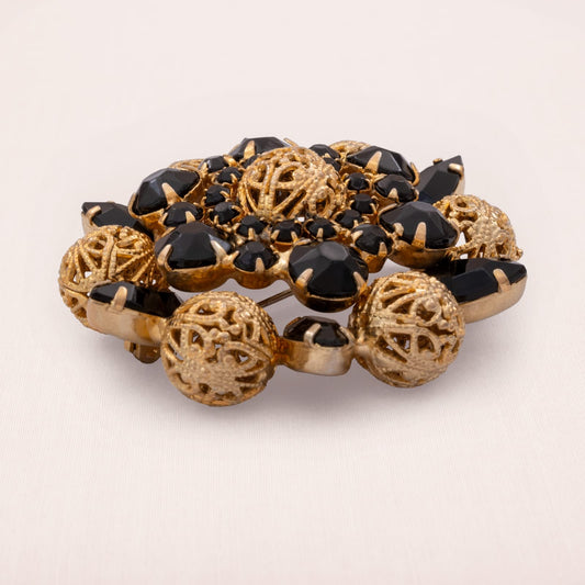 Vintage-Brosche-schwarzer-Strass-Stern-durchbrochene-vergoldete-Kugeln