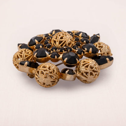 Vintage-Brosche-schwarzer-Strass-Stern-durchbrochene-vergoldete-Kugeln