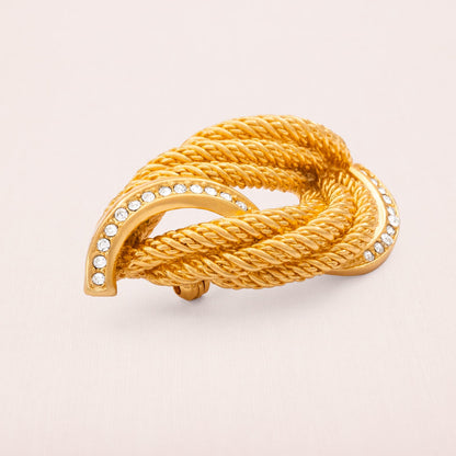 Christian-Dior-Brosche-elegant-geschwungenes-Design-vergoldet-kristallbesetzt