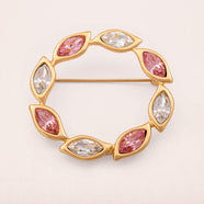 MONET Brosche Kranz vergoldet rosa weiße Navette Kristalle