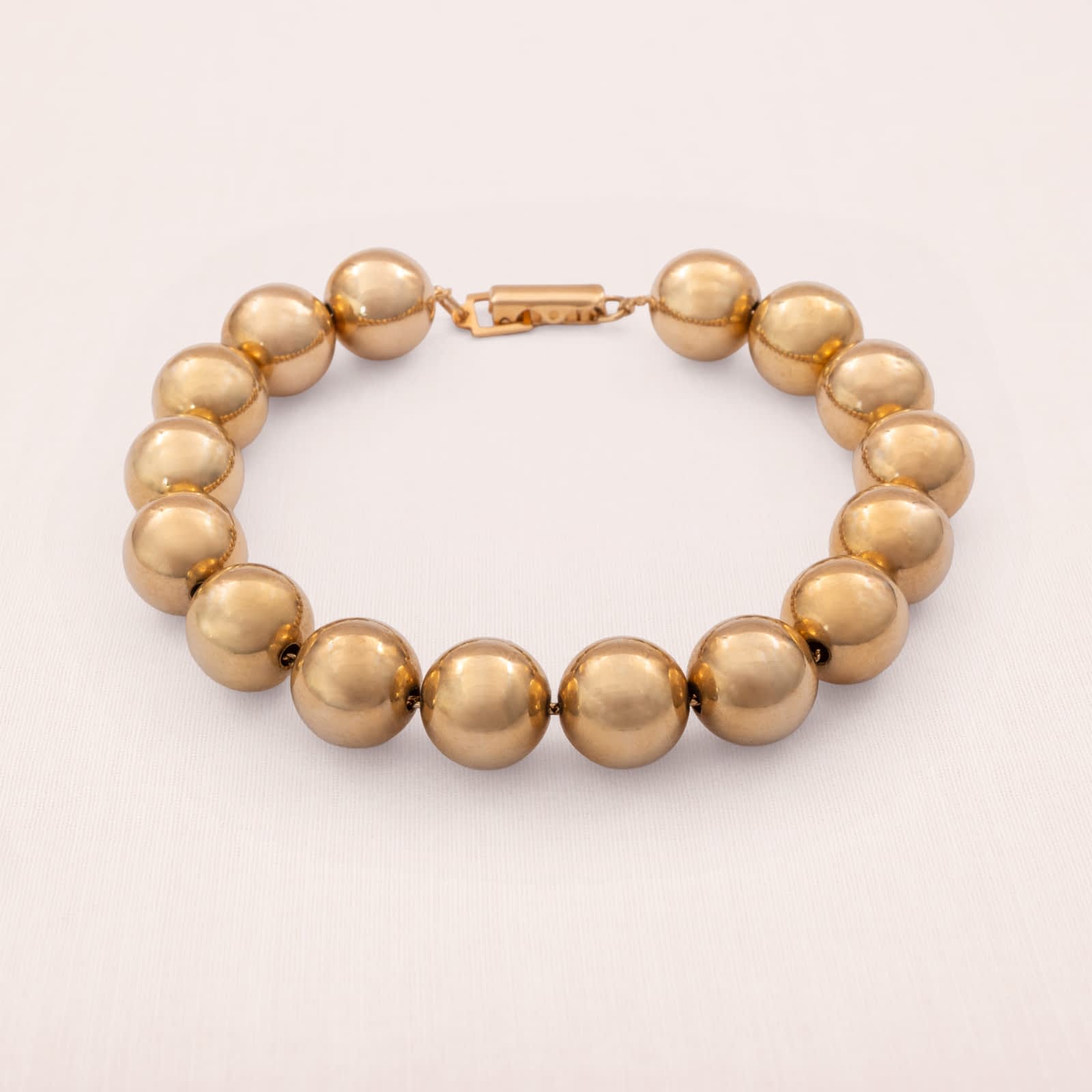 Sarah-Coventry-Kugel-Armband-vergoldet