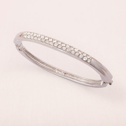 Swarovski-Armreif-zum-öffnen-rhodiniert-Kristallbesetzt-Schwan-signiert