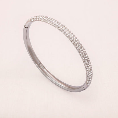 Swarovski-Armreif-zum-öffnen-rhodiniert-Kristallbesetzt-Schwan-signiert