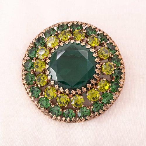 Albert WEISS brooch with green rhinestones