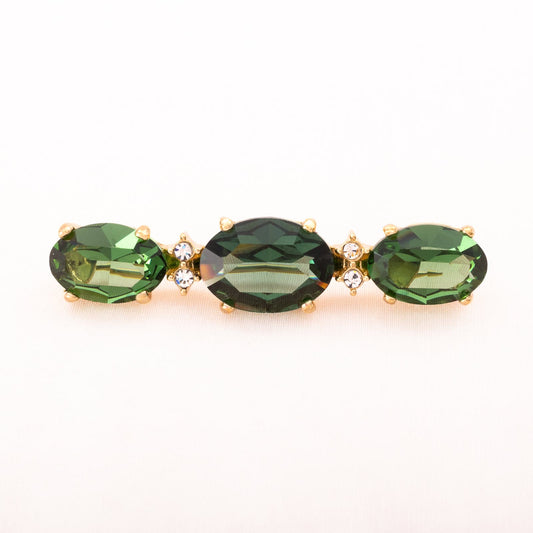 Christian-Dior-Brosche-mit-drei-ovalen-grünen-Kristallsteinen