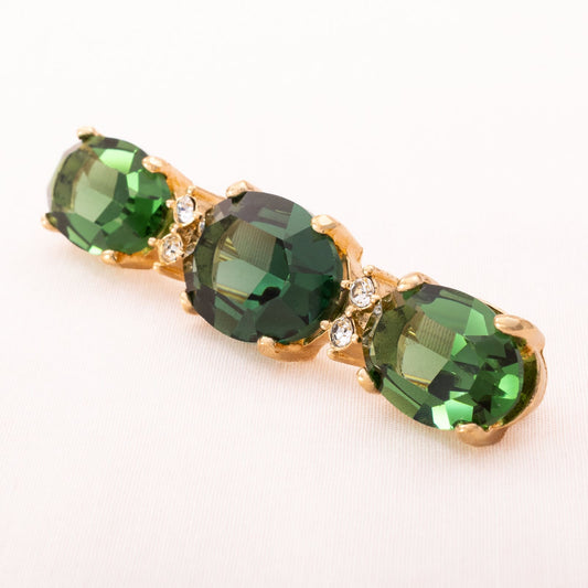 Christian-Dior-Brosche-mit-drei-ovalen-grünen-Kristallsteinen
