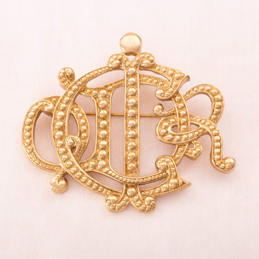 Christian-Dior-Logo-Brosche-vergoldet-1990er-Jahre