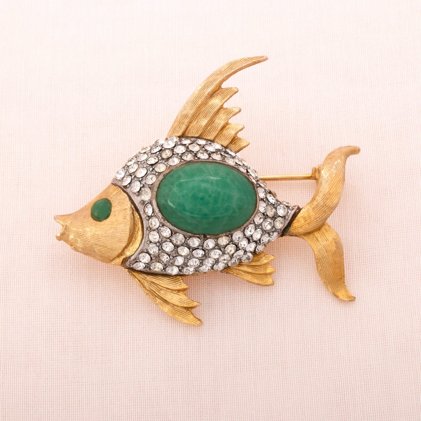Vintage designer fish brooch with green cabochons