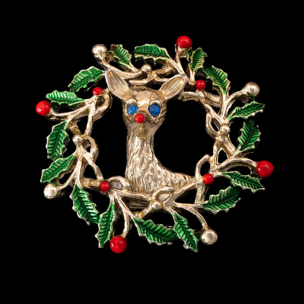 Gerrys-weihnachtliche-Brosche-Rehkopf-blaue-Strassaugen-Weihnachtskranz-umrandet