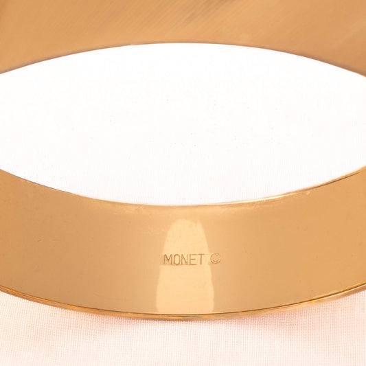MONET iconic bangle with a polished surface