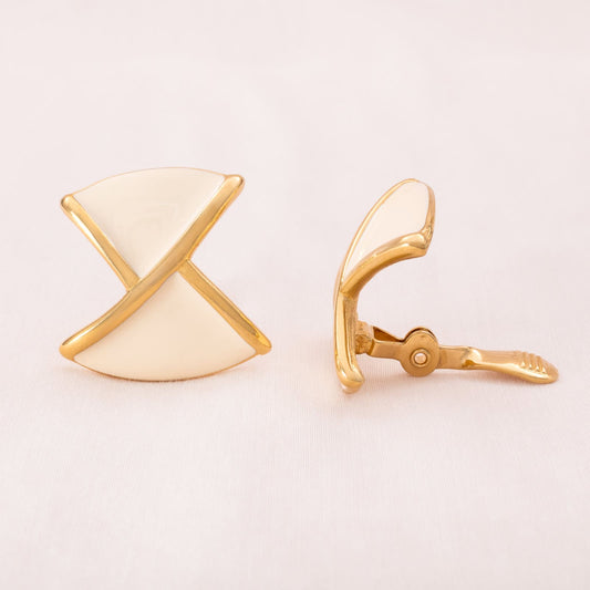 MONET elegant ear clips adorned with cream-colored enamel