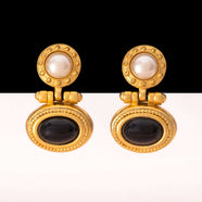 Elegante Ohrclips mit schwarzem Cabochon und Perle