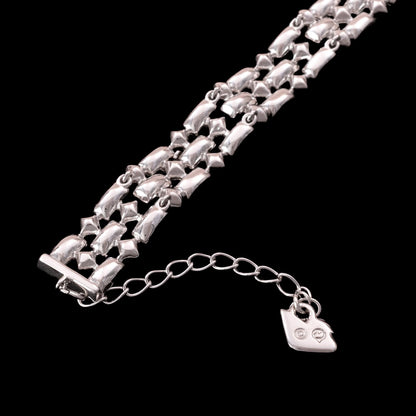 Swarovski-Armband-Baguettesteine-und-quadratische-Kristalle-Rückseite-Schwan-Signatur