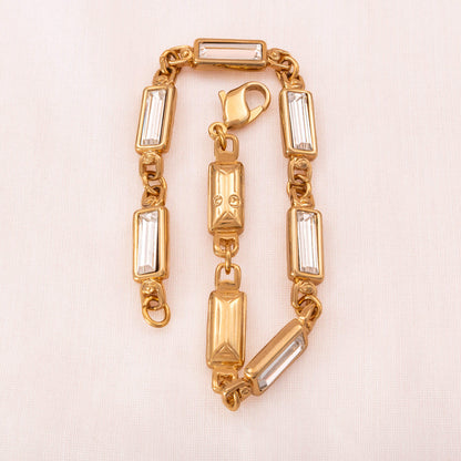 Swarovski-Armband-vergoldet-mit-Baguette-Kristallen-versehen-Schwan-Signatur-auf-der-Rückseite