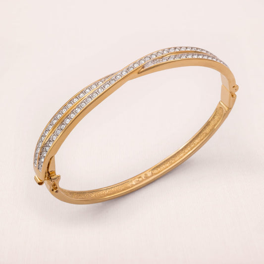 Swarovski-Armreif-vergoldet-Kristall-besetzt-signiert