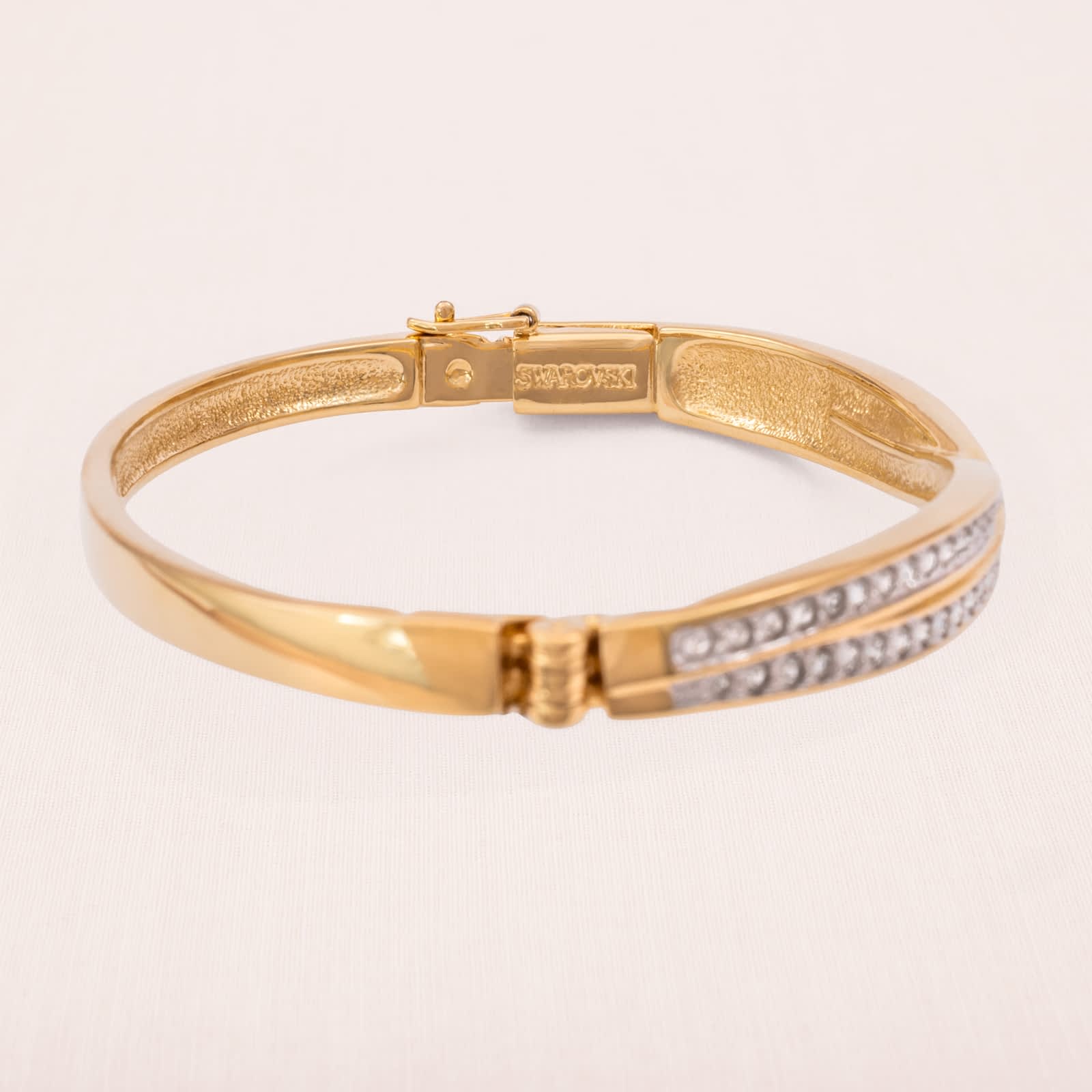Swarovski-Armreif-vergoldet-Kristall-besetzt-signiert