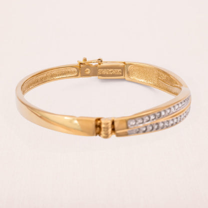 Swarovski-Armreif-vergoldet-Kristall-besetzt-signiert