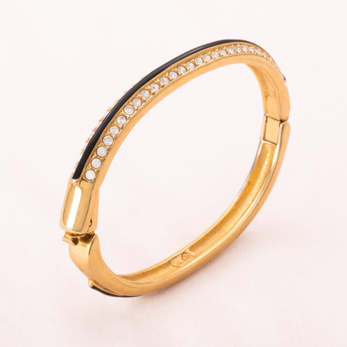 SWAROVSKI gold-plated bangle with black enamel stripe