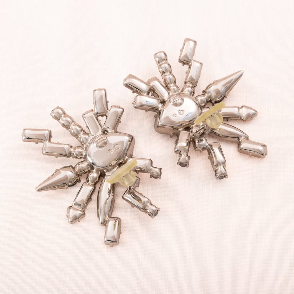 Swarovski-Ohrclips-Satelit-Design-rhodinierte-Rückseiten-Schwan-signiert