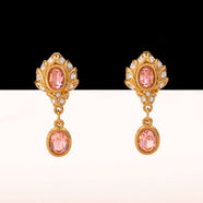 SWAROVSKI Elegante Vergoldete Ohrclips mit Rosa Kristallen