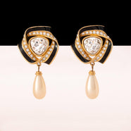 SWAROVSKI Vintage clip-on earrings with crystals, enamel, and pearl drops