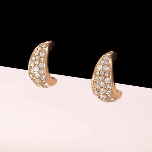 SWAROVSKI gold-plated earrings as crystal-set half hoops