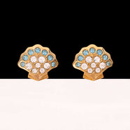 SWAROVSKI Ohrringe Muscheldesign mit weißen und hellblauen Kristallen