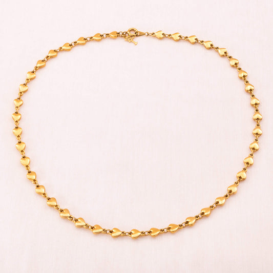 Trifari-Halskette-aneinandergereihte-vergoldete-Herzen