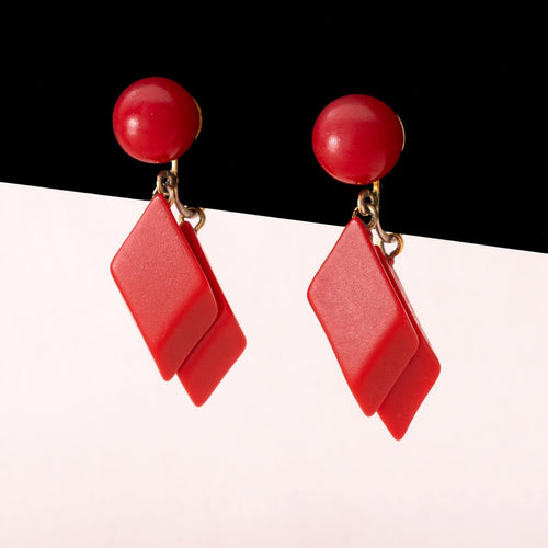 TRIFARI red ear clips from the 1950s