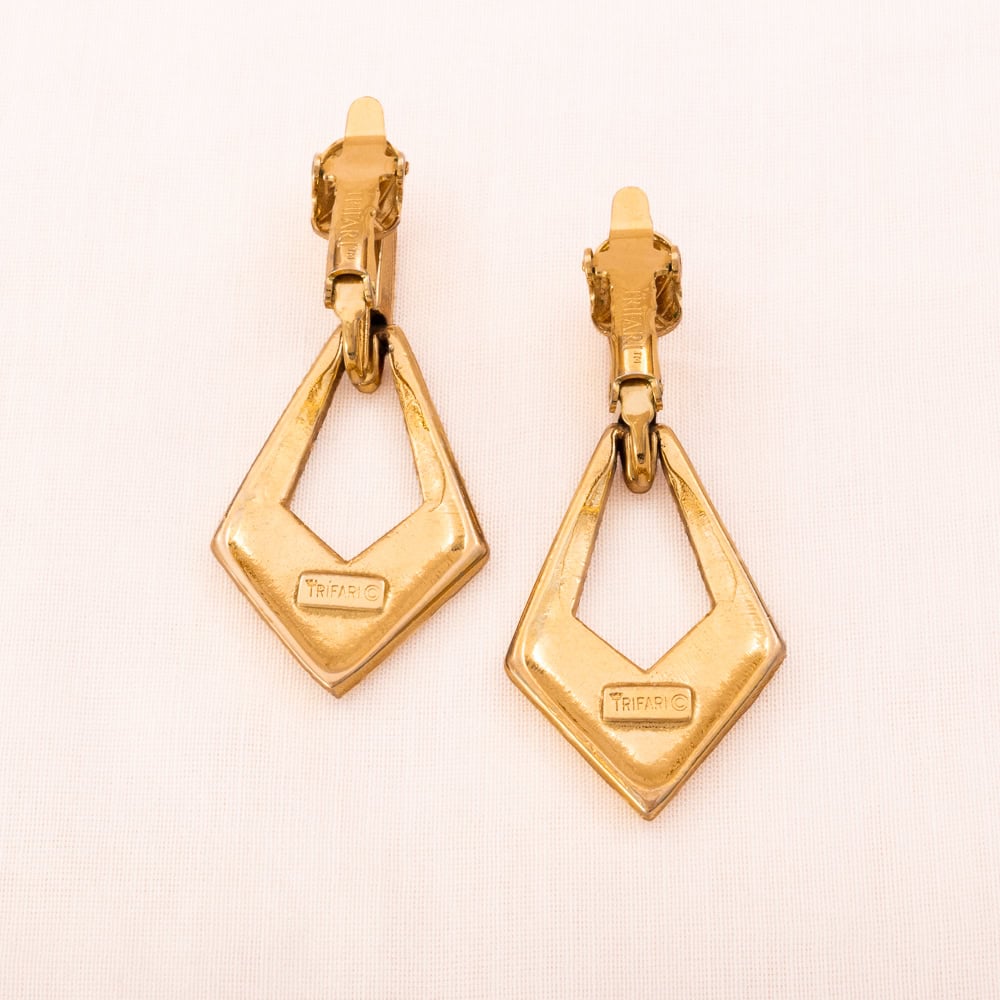 TRIFARI clip-on earrings gold-plated dangles with black enamel geometric 1990s vintage
