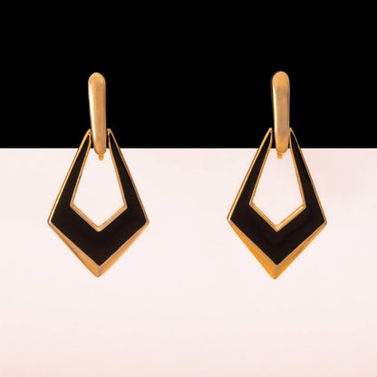 TRIFARI clip-on earrings gold-plated dangles with black enamel geometric 1990s vintage