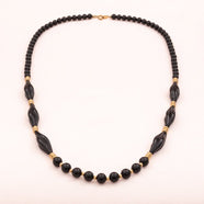 TRIFARI necklace black plastic beads with gold-plated elements