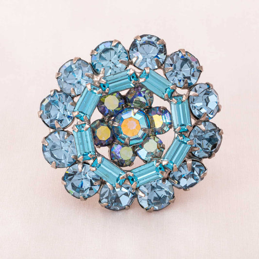Albert-Weiss-runde-Brosche-blaue-Strasssteine-Aurora-Borealis