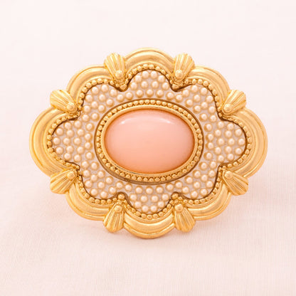 AVON brooch with pink cabochon from 1988