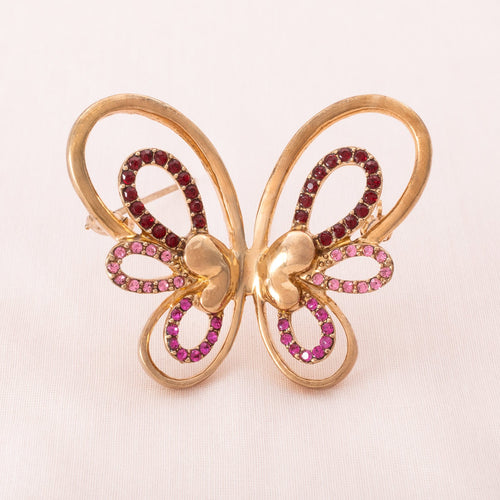 Enchanting butterfly brooch with pink rhinestones