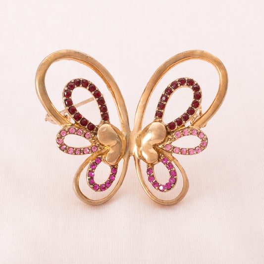 Schmetterling-Brosche-vergoldet-mit-rosa-roten-Strasssteinen-verziert