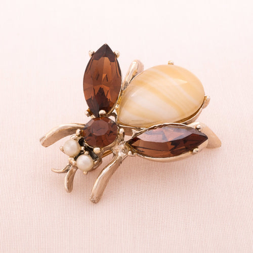 Bee brooch with brown rhinestones and pearl eyes