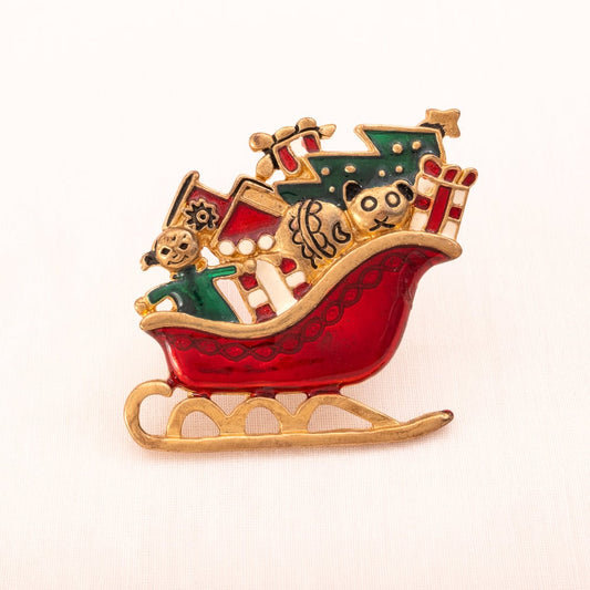 Weihnachtsmann-Schlitten-Brosche-vergoldet-Emaille-rot-grün-weiß
