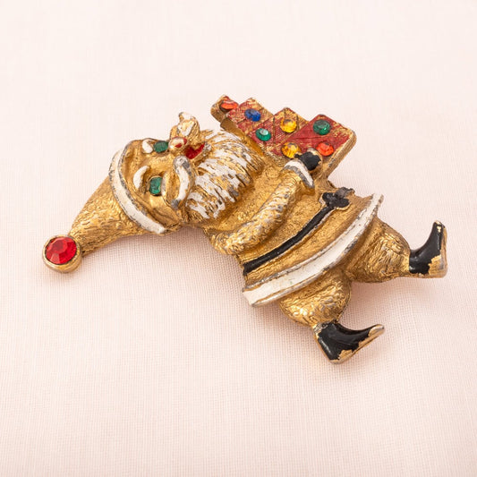 Vintage-Brosche-vergoldeter-Weihnachtsmann-mit-Geschenken-Strass-verziert