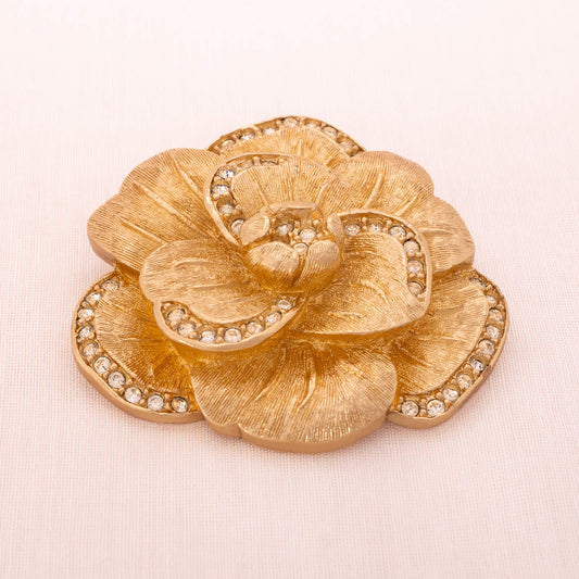 Christian-Dior-Brosche-vergoldet-mit-Kristallen-verziert