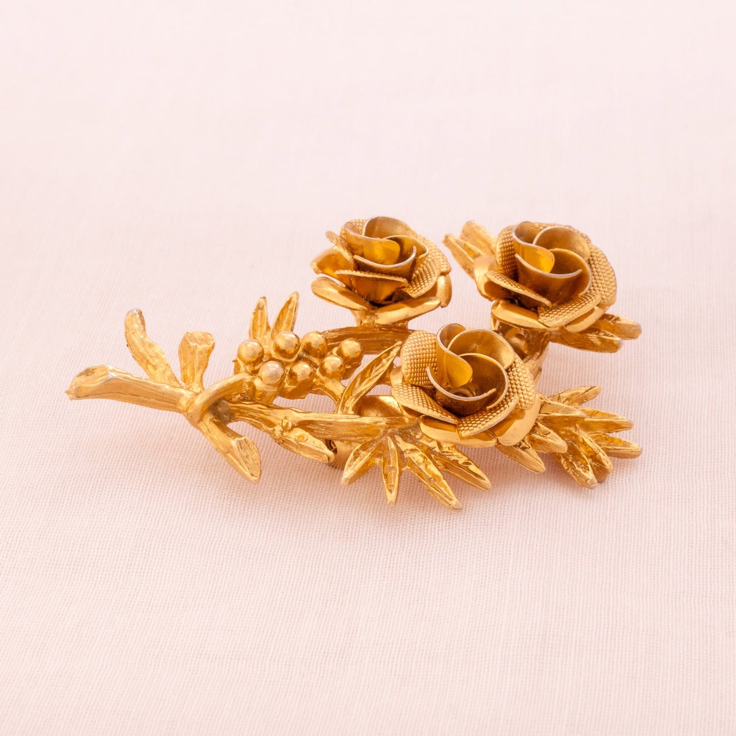 CORO gold-plated rose brooch