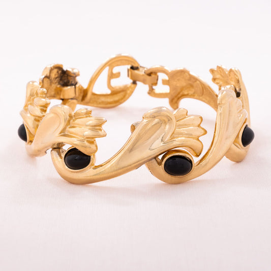 Givenchy-vergoldetes-Armband-mit-schwarzen-Cabochons-versehen