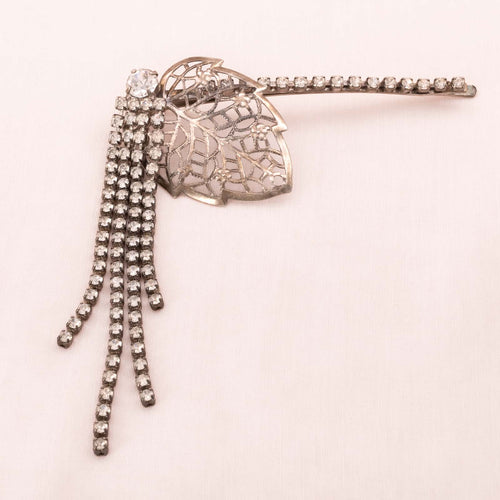 Haarspange in Blattform mit Strass besetzt