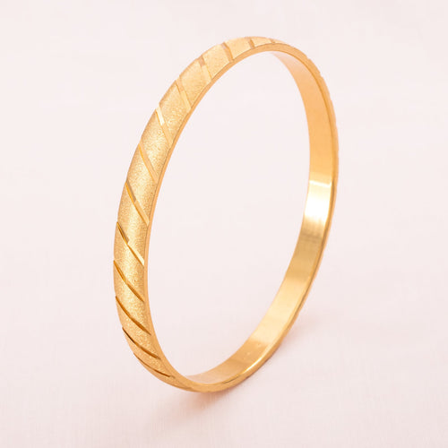 MONET gold-plated bangle with striped structure