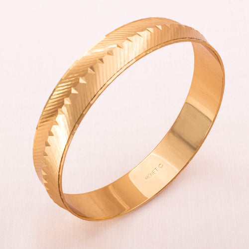 MONET gold-plated bangle with striped structure