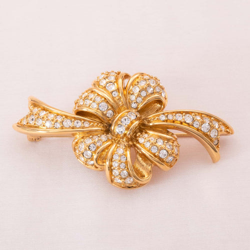 SWAROVSKI gold-plated bow brooch