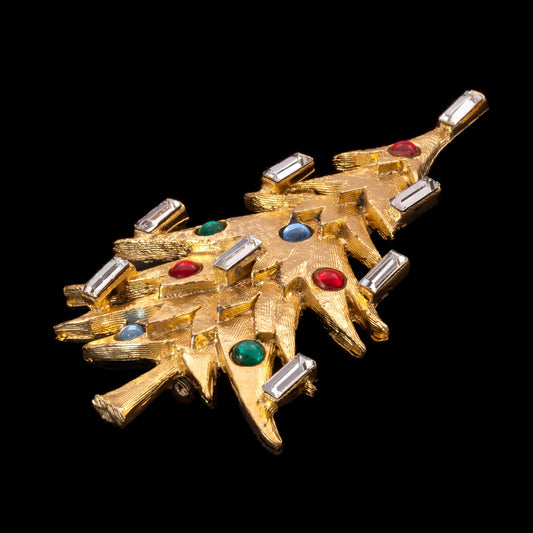 Sphinx-Weihnachtsbaum-Brosche-vergoldet-Baguettesteine-als-Kerzen-bunte Strasssteine
